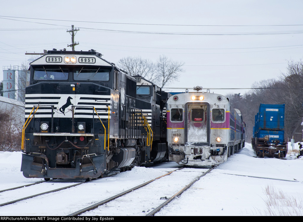 Commuter passes freight